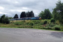 Train Approaching Pandy Road Bridge Wallpaper