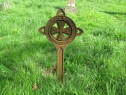 On of the three similar headstone's in the Churchyard Wallpaper