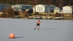 Ice skating on Tattershall lake Wallpaper