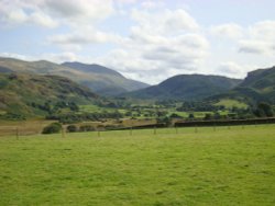 Surrounding landscape, a slope of Blencathra is on the left Wallpaper