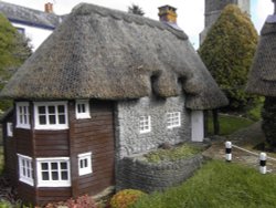 Model of Church Gate Cottage at Godshill Model Village. Wallpaper