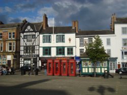 Four telephone boxes at Market Place Wallpaper