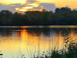 Sunset over the lake at Watermead Country Park Wallpaper