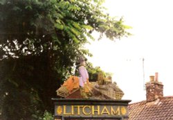 Litcham Village Sign - Very high up Wallpaper