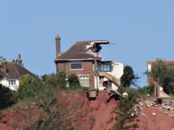 House split in half due to a landslide