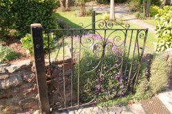 Cockington village in Devon  The iron gate Wallpaper