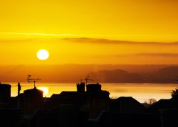 Sunrise across the rooftops, Chepstow. Wallpaper