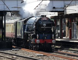 Tornado steam train passing through Lancaster, Lancashire Wallpaper