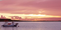 Fishing Boat Sunset from Mudeford Quay Wallpaper