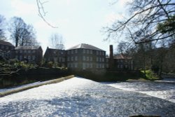 The Old Mill, now private apartments, on the River Nidd at Knaresborough. Wallpaper