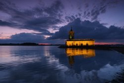 The Normanton Church illuminated at night. Wallpaper