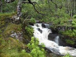 Waterfall leading down into Loch Lomond. Wallpaper