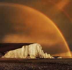 Golden Rainbow over the Seven Sisters Wallpaper