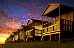 Whitstable Beach Huts at Dawn Wallpaper