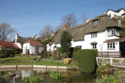 Thatched cottages in The City, Bishopstone Wallpaper