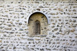 The rare Saxon window in St. Andrew's Church Wallpaper