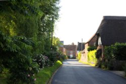 Attractive landscaping beside the road in Eastbury Wallpaper