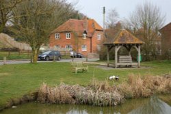 A quiet corner by the duck pond in West Ilsley Wallpaper