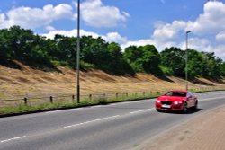 Bentley Continental GT Driving by the Old Brooklands Banking Wallpaper