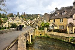 View Up The Street from the Bridge Over By Brook in Castle Combe