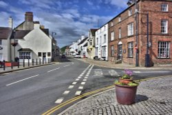 View West Along Castle Street in Beaumaris, with the Spinning Wheel Tearooms on the Right Wallpaper