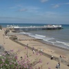 The beach front at Cromer, with Cromer pier in the background, Norfolk