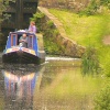The Huddersfield Canal going through Mossley
