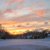 Stourhead frozen lake sunset