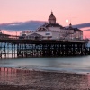 Moon over Eastbourne pier