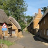 Thatched ironstone cottages in Wroxton
