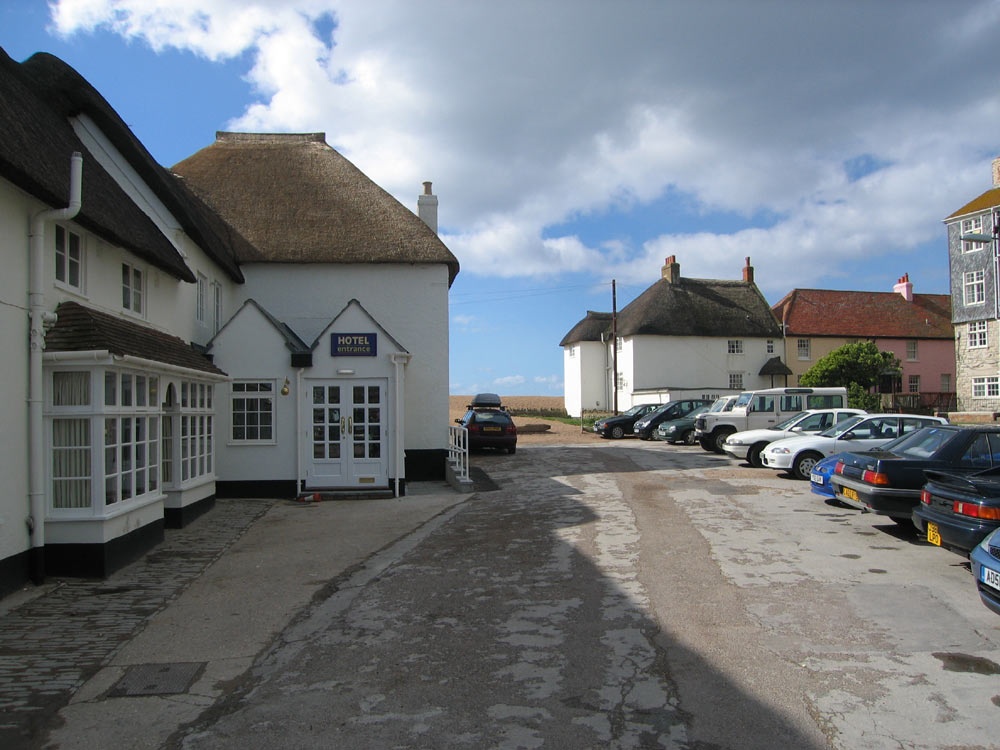 At the side of the Bridport Arms leading to the beach
