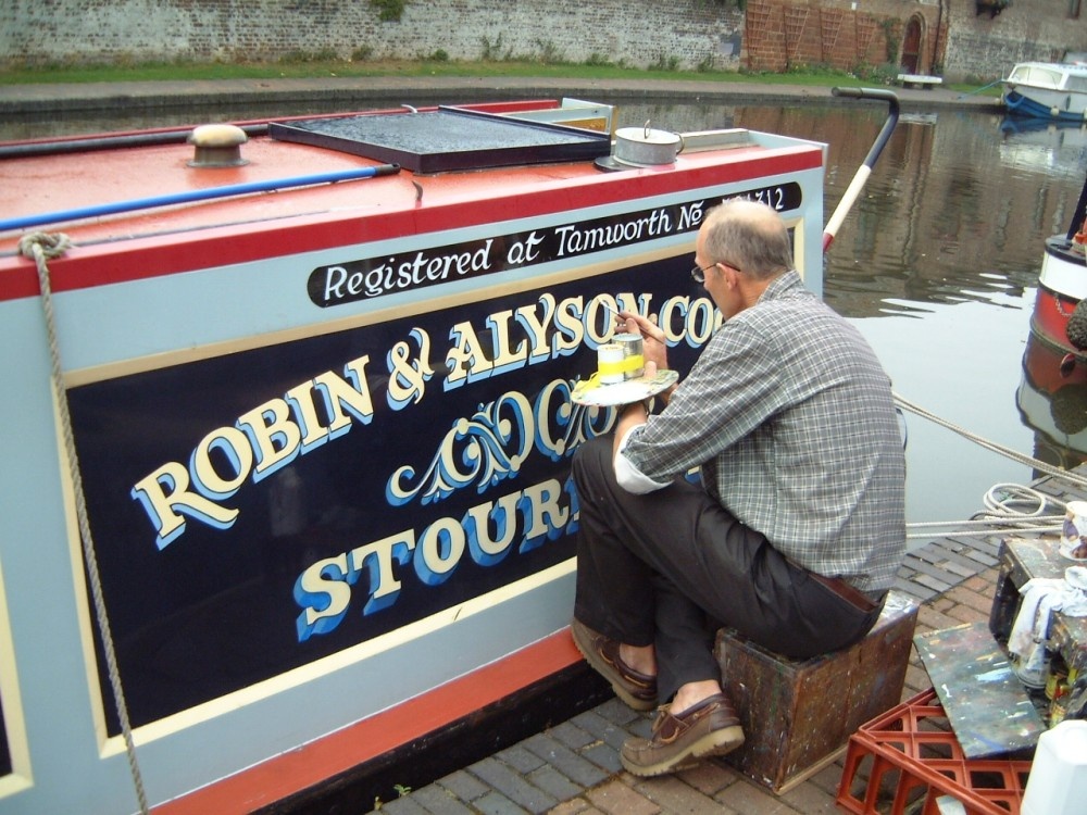 A boat gets a new name in Stourport, in memory of The Late David Whittamore