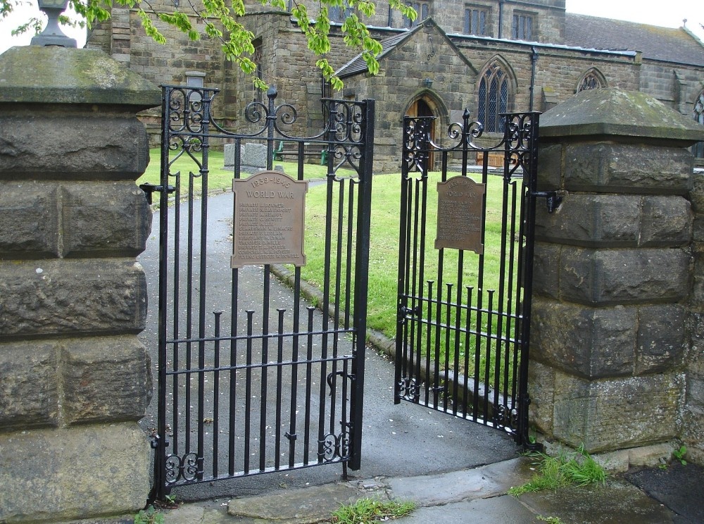 The main gates to St Mary's Church, Crich, Derbyshire form a World War II memorial.