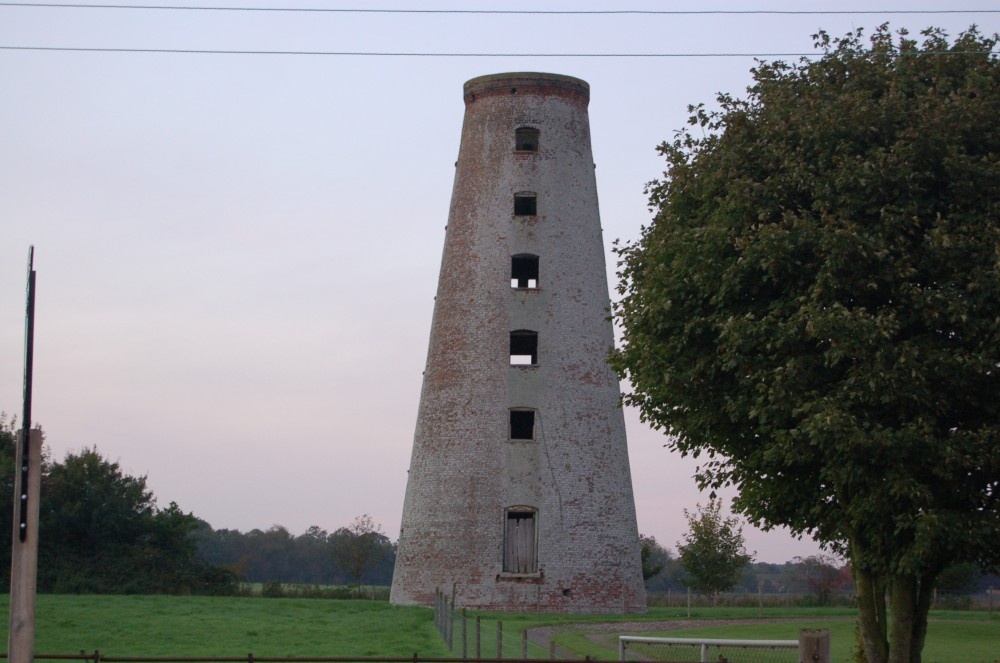 An old Disused windmill at East Kirkby at sunset in October 2006