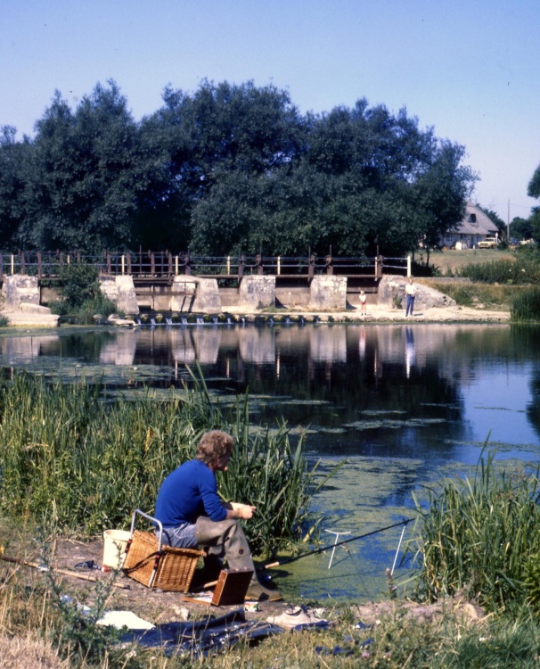 An angler at Throop, on the rural northern fringe of Bournemouth