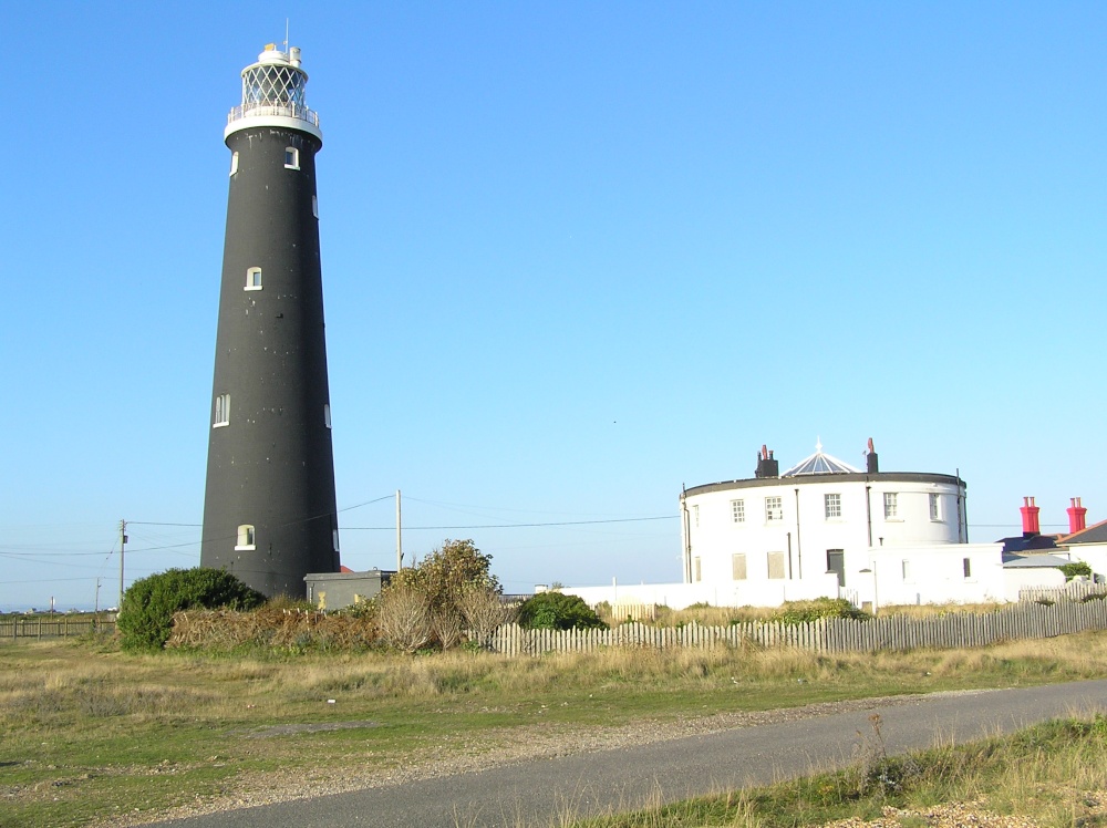 The old lighthouse, Dungeness, Kent, sits comfortably in the very distinctive landscape.