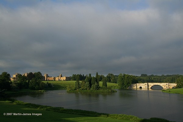 Blenheim Palace, lake, bridge, and island, dawn, midsummer