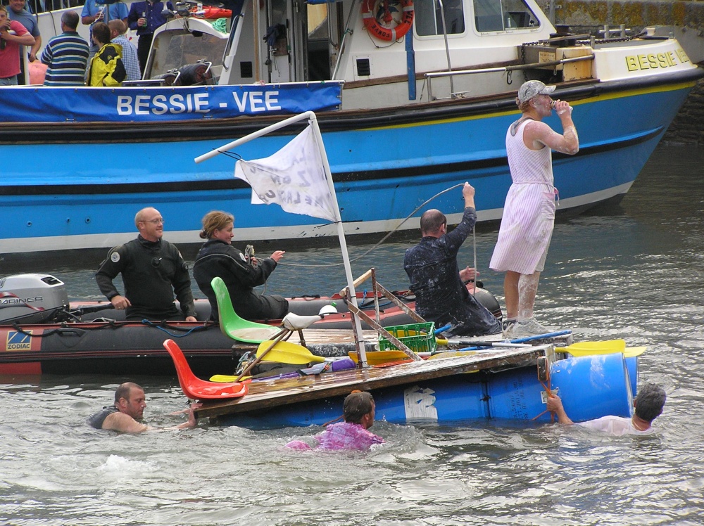 Raft race at Feast Week in Mevagissey, Cornwall