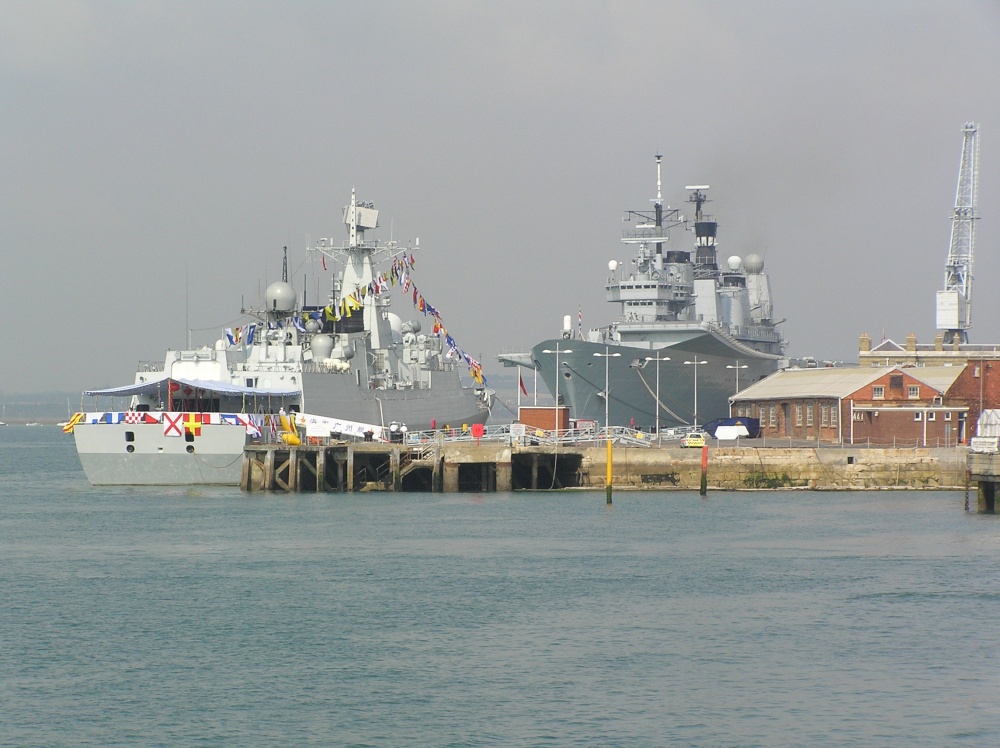 Chinese missile destroyer Guangzhou and Ark Royal at Portsmouth, Hampshire
