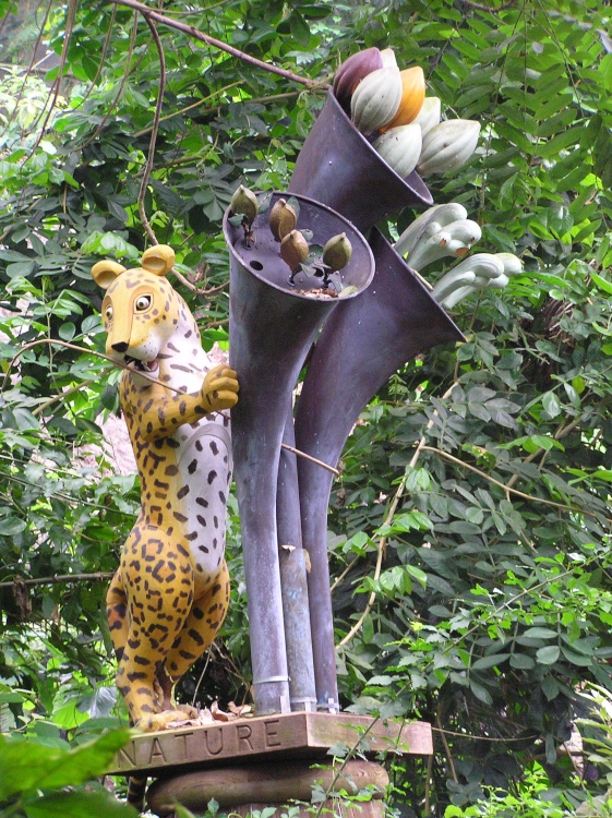A jaguar supports a natural cornucopia in Eden's tropical biome