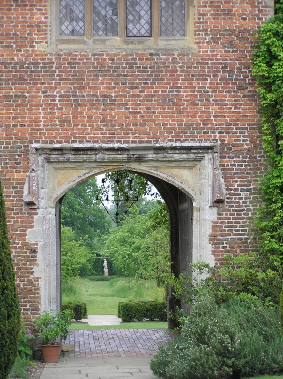 Tantalising view through the archway under the tower at Sissinghurst