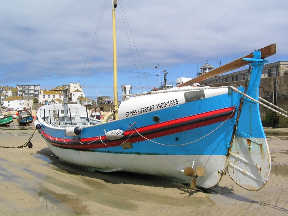 The old lifeboat stranded at low tide in St Ives harbour.