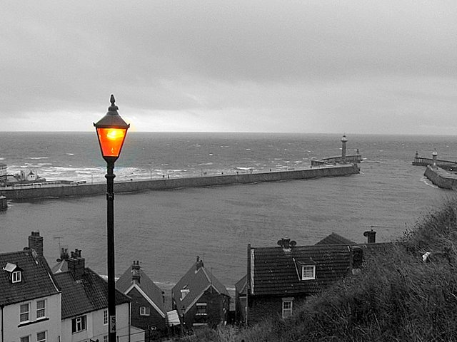 Lamp light on the steps to Whitby Abbey
