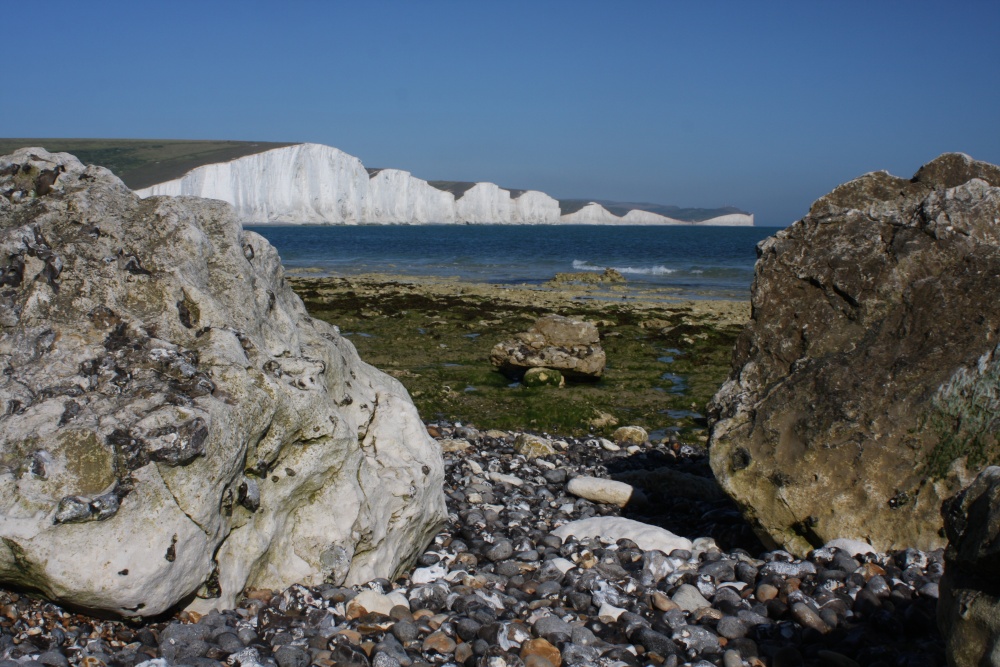 The Seven Sisters from between two rocks at the base of Short Cliff