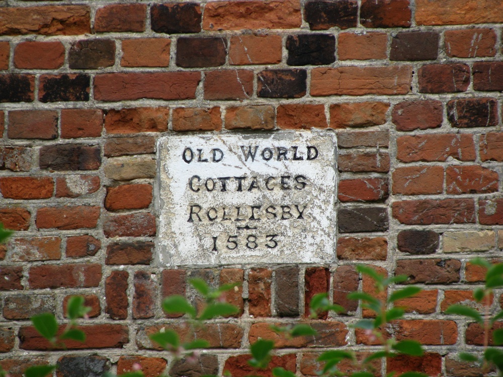 Plaque on a house near the Church, house was surrounded by trees which prevented a picture of it