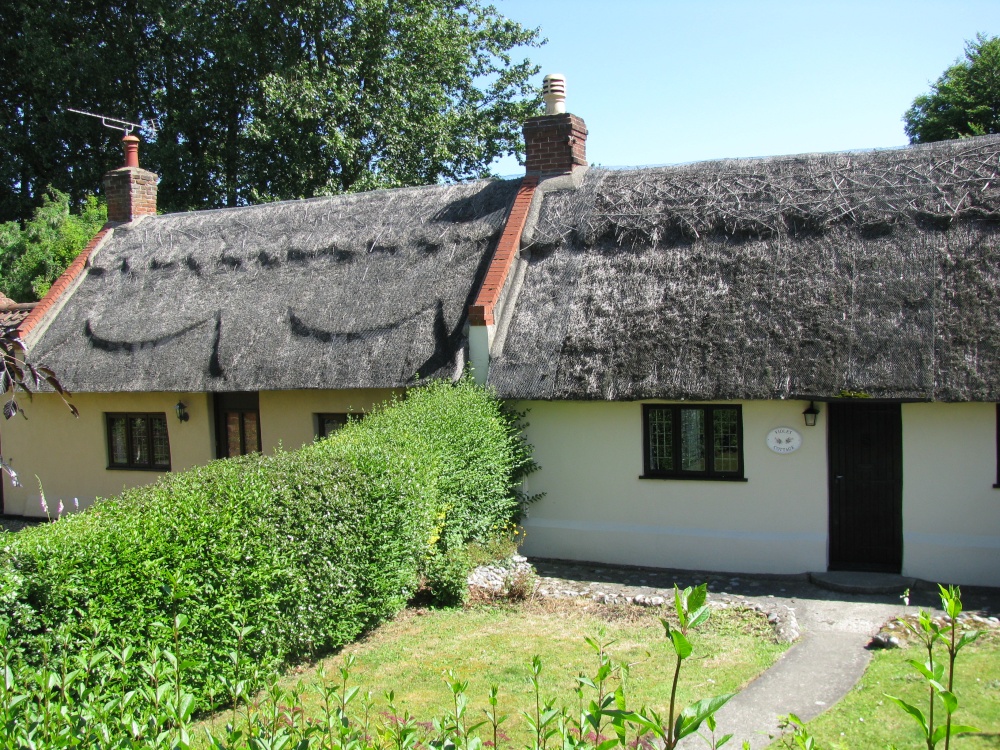 Thatched Bungalows in a secluded setting just off the main street