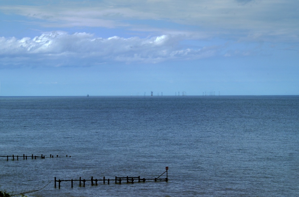 View of the wind turbines from the cliff top.
