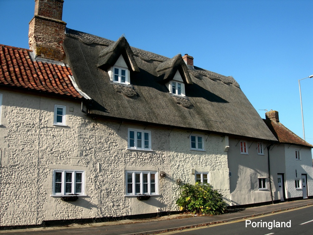 Thatched Cottages opposite the church