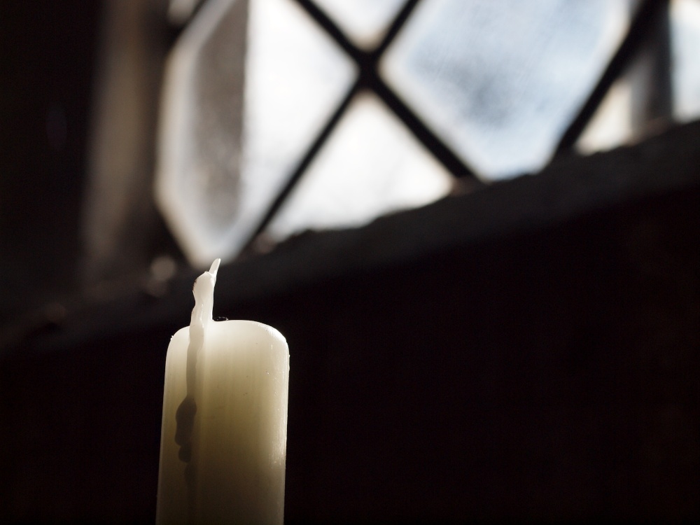 Candle in Noke Village Church, Oxfordshire