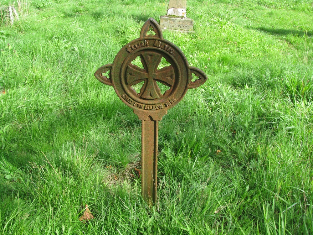On of the three similar headstone's in the Churchyard